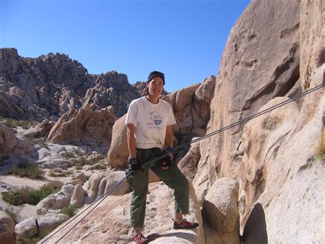 Rappelling Off The Top Of A Climb At Indian Cove Joshua Tree Ca
