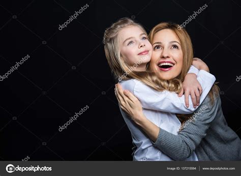 Mother And Daughter Embracing — Stock Photo © Igortishenko 137215594