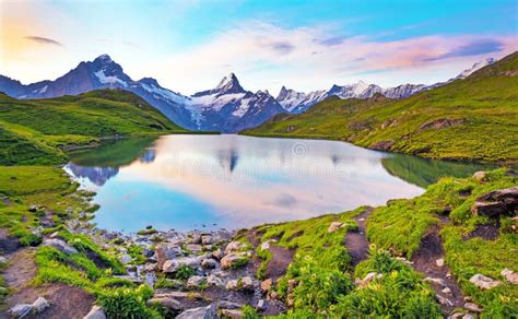 Fantastic Landscape At Sunrise Over The Lake In The Swiss Alps Europe