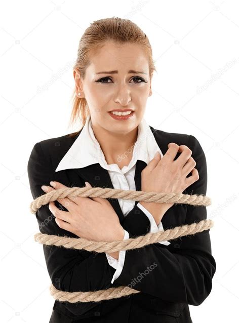 Businesswoman Tied With A Rope Stock Photo By Xalanx
