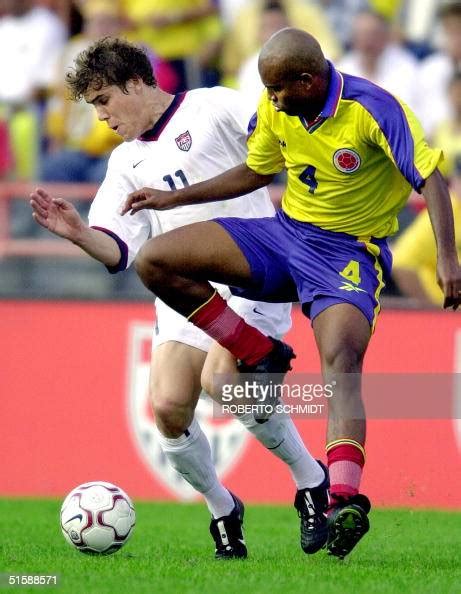 Alexander Viveros Of Colombia Tries To Get The Ball Away From Chris
