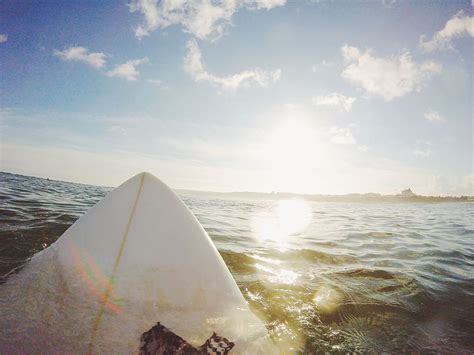 Surfboard Surfing Ocean Sea Water Sunshine Sun Rays Sports Sky