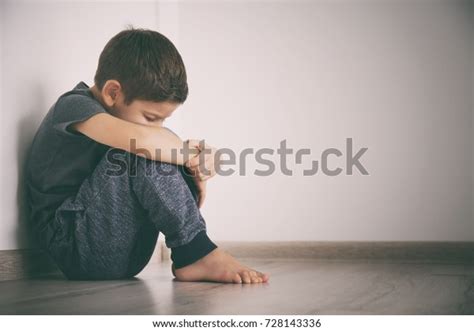 Little Sad Boy Sitting On Floor Stock Photo Edit Now 728143336