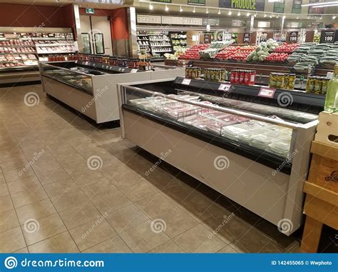 Our products range from sweets to canned fish and frozen red caviar. Food store in Canada editorial image. Image of grocery ...