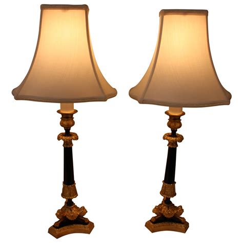 Pair Of Bronze Candlestick Lamps At 1stdibs