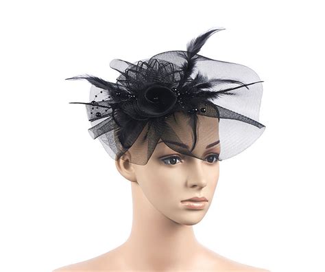 Curly and wavy hair texture can be fantastic to this look. Large Black Fascinator | Fascinator, Wedding hair ...