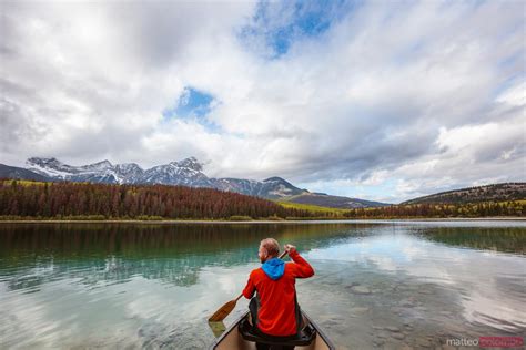 Man Sitting Near Moraine Lake Banff National Park Canada Royalty