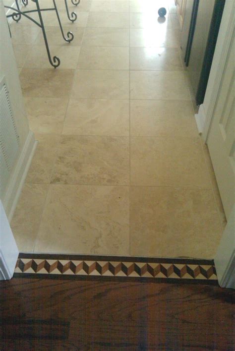 Maybe you would like to learn more about one of these? Border transition from wood floor to tile flooring ...