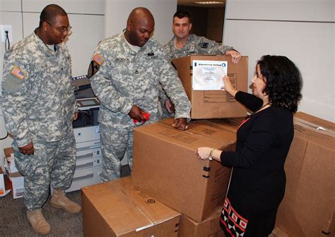 470th Military Intelligence Brigade Members Collect Clothing For Haiti