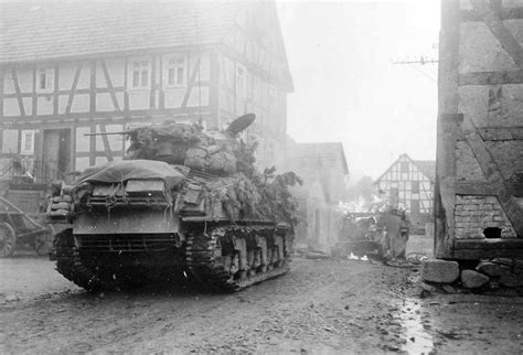 A 7th Armored M4a3 76mm Moves Into Deekenbach On March 29 1945 Tanks