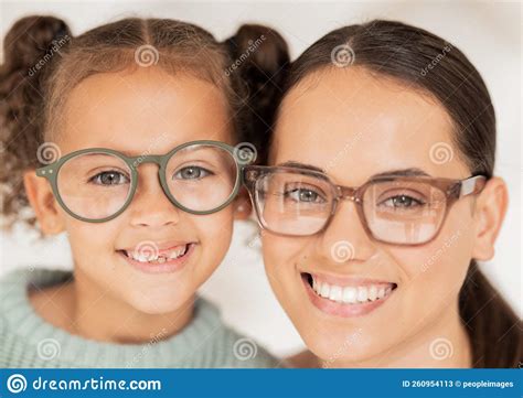 Optometrist Vision And Portrait Of Mother And Child Smiling Together