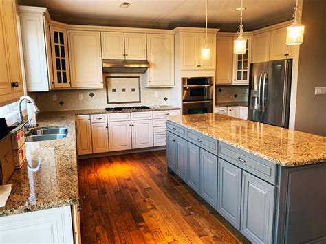 Our kitchen cabinets, approaching 20 years old, are solid maple with a natural finish that has yellowed over the years.we love the look of natural wood and do not want to paint them. Beautifully Refinished Maple Cabinets by Grande Finale