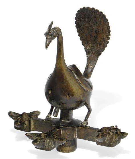 .which include peacock hanging oil lamp, bronze oil lamp and vintage oil lamp. A LARGE BRONZE OIL LAMP IN THE SHAPE OF A PEACOCK | DECCAN ...