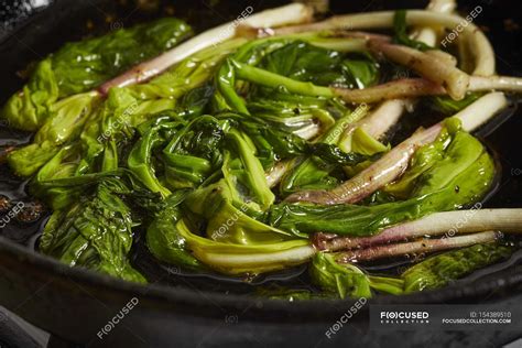 Fried Wild Leeks In Pan — Close Ups Vegetable Stock Photo 154389510