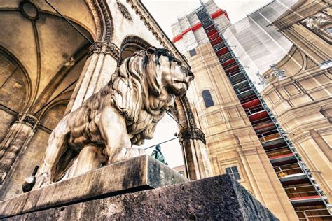 Low Angle Shot Of The Famous Lion Statue In Odeonplatz Munich Germany