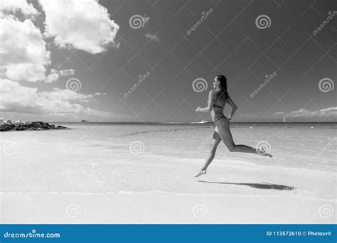 Girl With Body In Swimsuit Running On Sea Beach Stock Photo Image Of
