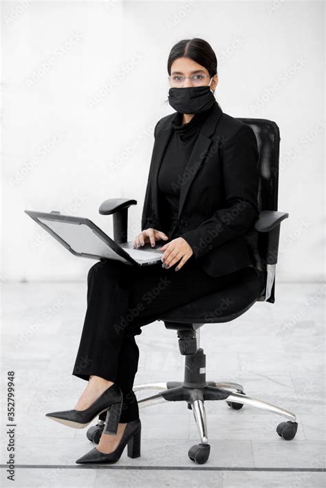 Masked Woman A Woman Dressed Up In Office Or Student Attire Wearing A