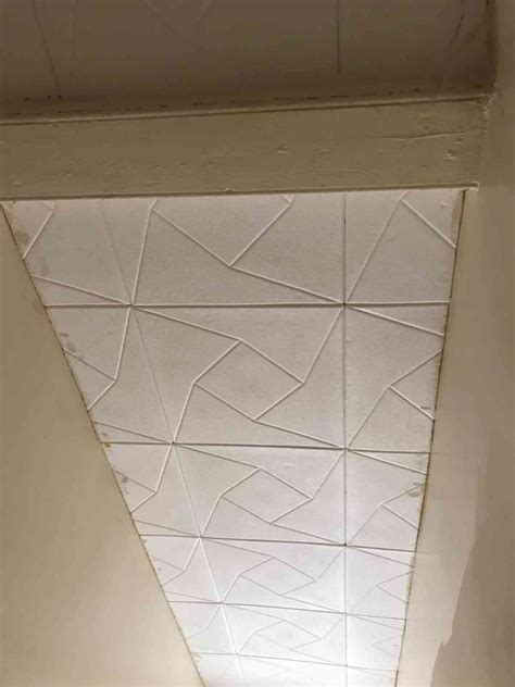 Polystyrene ceiling tiles can be installed directly on flat or popcorn ceilings. Polystyrene ceiling tiles illegal? No... Just a fire risk!