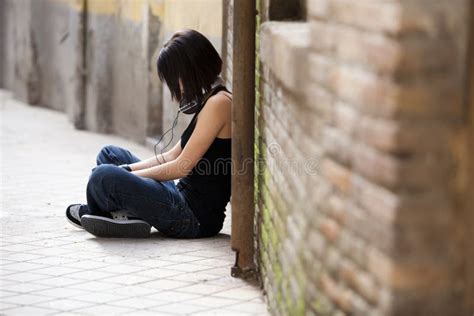 Sad Teenage Girl Sitting Alone In Urban Environmen Stock Image Image Of Slim Female 26612265