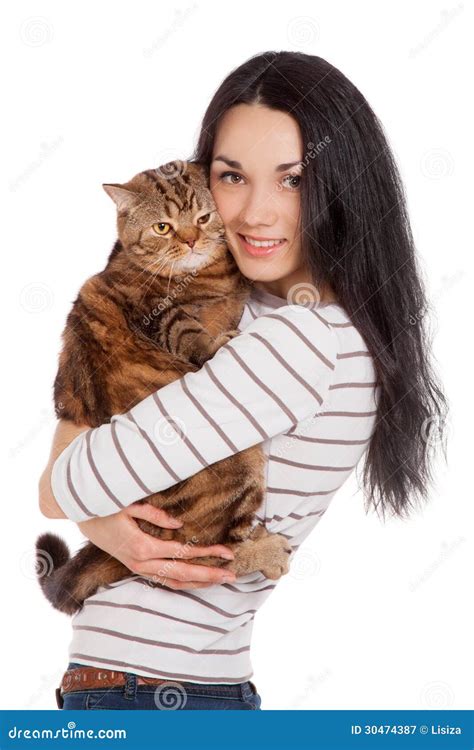 Beautiful Smiling Brunette Girl And Her Ginger Cat Over White Ba Royalty Free Stock Photography