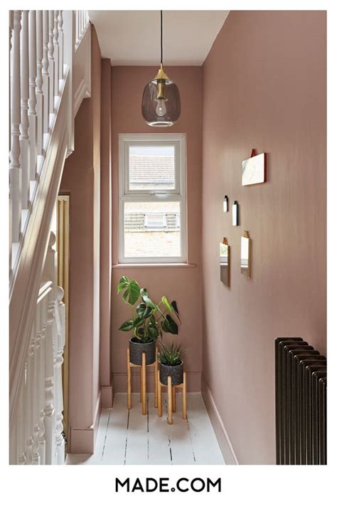 Plaster Pink Walls Brighten The Staircase Add Terrazzo Planters For An On Trend Statement And A