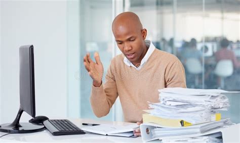 Stress Documents And Burnout With A Business Black Man In An Office