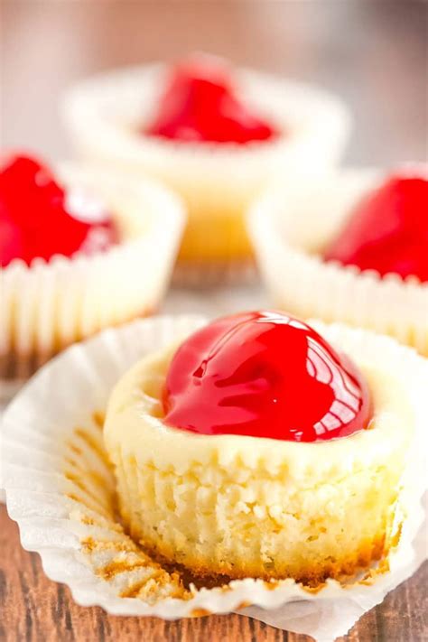 These mini cheesecakes are thick, smooth and creamy, with a little tang from some sour cream! Pin on Recipes