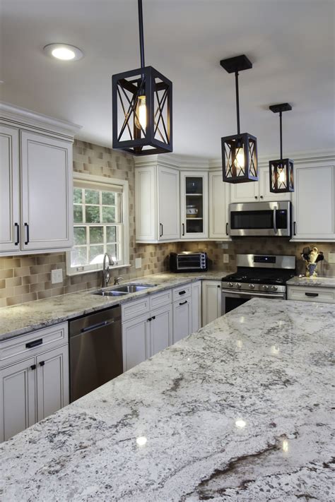 Pendant Lighting Over Island Granite Countertops And Subway Tile Backsplash Kitchen Remodel