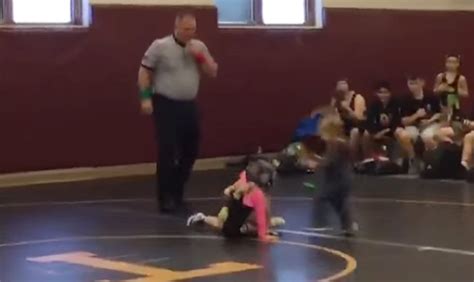 little brother swoops in to save sister during wrestling match