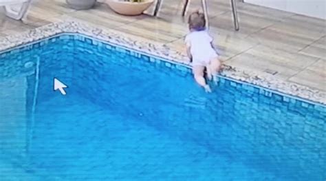 Here S Crazy Footage Of A Dad Leaping Into A Pool To Save His Drowning Baby Digg