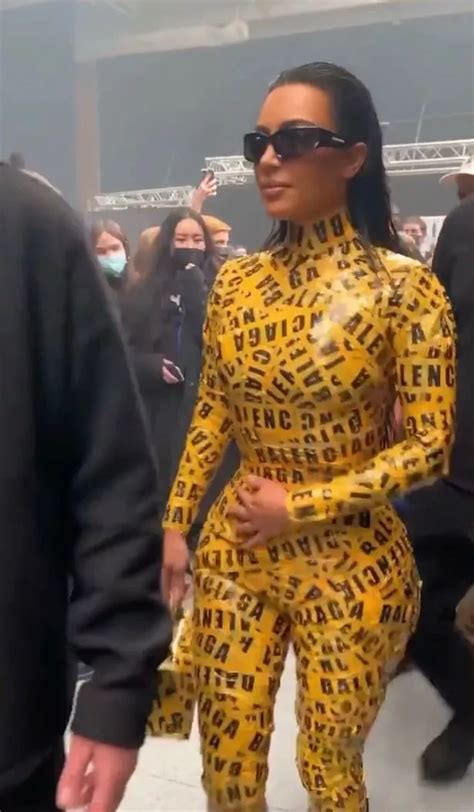 kim kardashian in balenciaga caution tape outfit is a legend we all can t forget