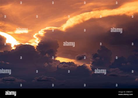Sunset Sky Golden Light Shine In Layers Of Clouds Fluffy Clouds At
