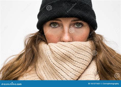 Portrait Of Woman Wrapped In Winter Had And Scarf Winter Woolen