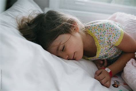 Young Girl Sleeping In Bed Del Colaborador De Stocksy Maria Manco Stocksy