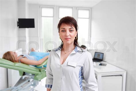 professional gynecologist examining her patient stock image colourbox