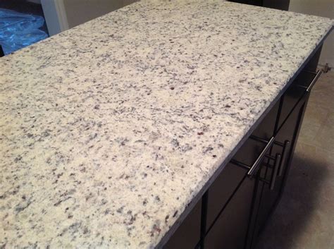 Rich taste in your dream kitchen. Dallas White granite countertops with dark cabinets - LOVE ...