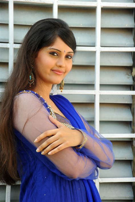 Beautiful South Indian Model Actress Surabhi Long Hair Photos In Blue