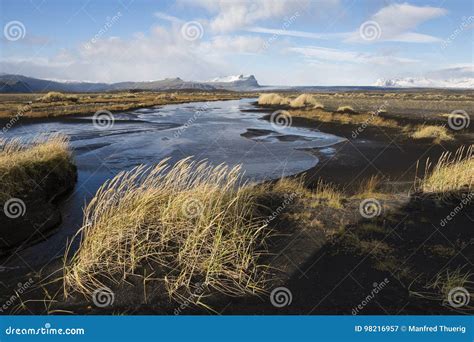 Autumn Landscape In Iceland With A River Black Sand Stock Image