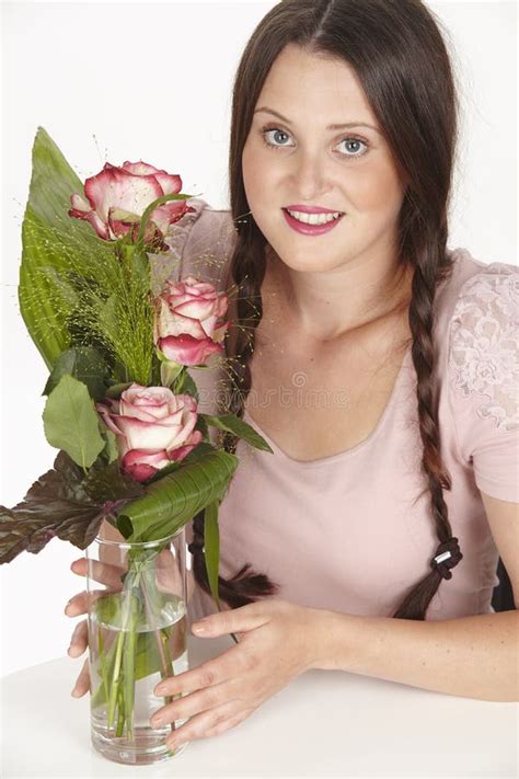 Bouquet Of Pink Roses And Brunette Young Woman With Pigtails Stock