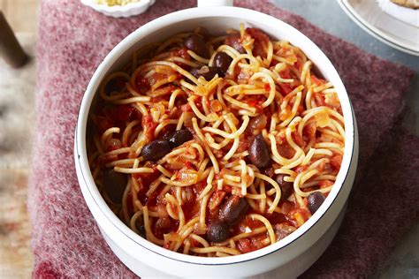 slightly spicy and utterly irresistible this spaghetti amatricana served with grated parmesan