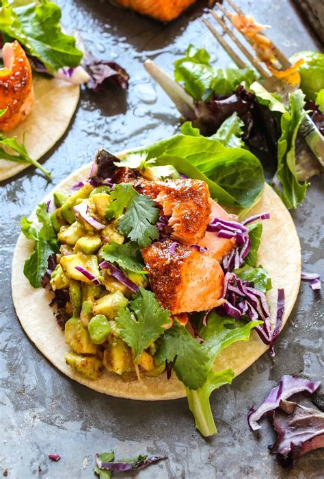 Salmon is seasoned with mexican spices then grilled for a light char, then it's flaked into pieces and served over tacos along with fresh avocado and other break salmon into small portions and layer over center of tacos, add cabbage, avocado salsa and cotija cheese. Orange Glazed Cajun Salmon Tacos (My Favorite Tacos Ever ...
