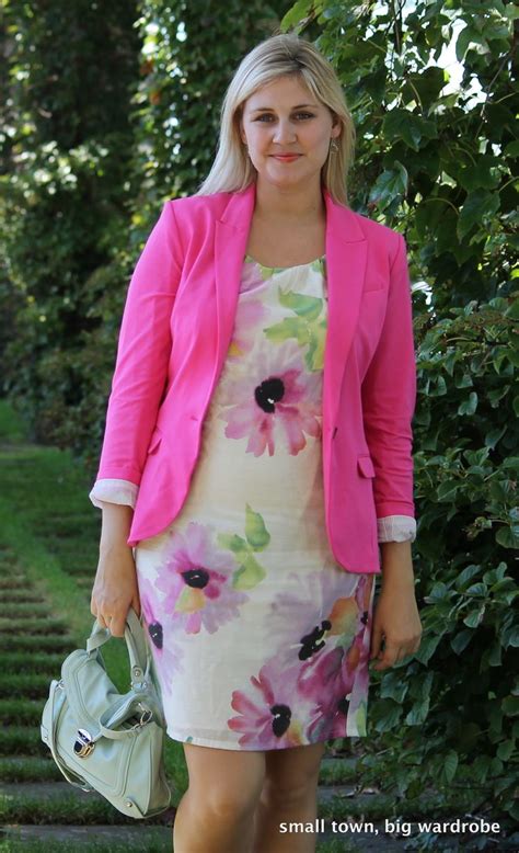 A Pink Blazer With A Floral Dress