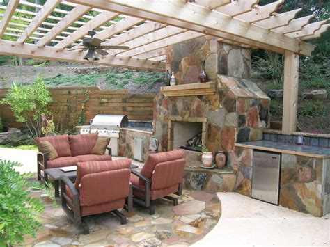 Fireplace With Pergola And Outdoor Kitchen Tropical Patio Atlanta