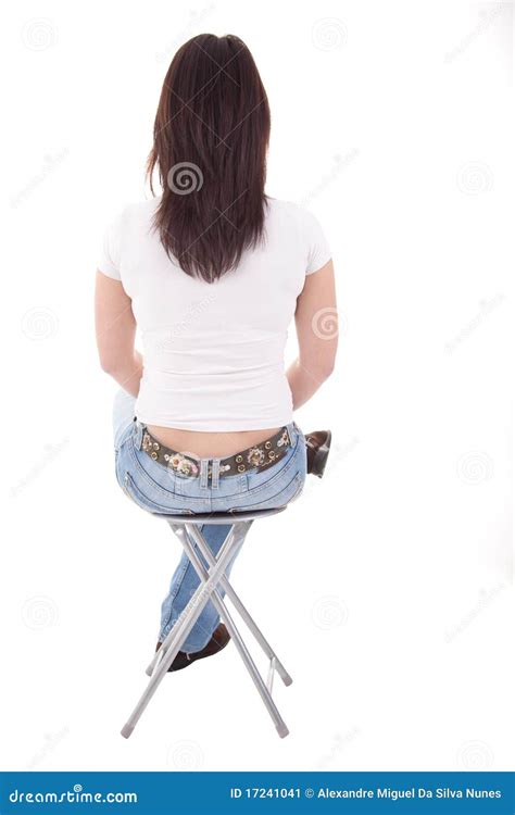 Woman Sitting On A Bench In Back Stock Image Image