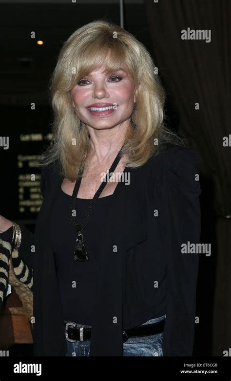 Loni Anderson Attends An Auction Of Burt Reynolds Property By Julien S Auctions Held At The