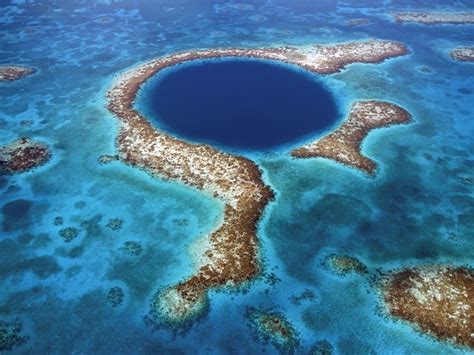 The blue hole in belize is a limestone sinkhole, and is perfectly circular. What It's Really Like To Dive The Great Blue Hole - Belize ...