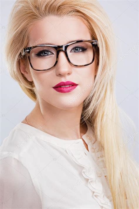 Beautiful Blonde Girl Wearing Glasses Stock Photo By VelesStudio 102661202