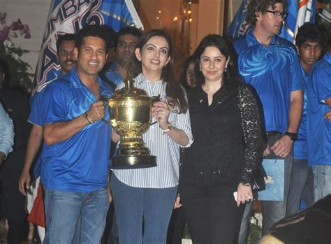 Nita Ambani Holding Ipl Trophy With Sachin Tendulkar And His Wife At