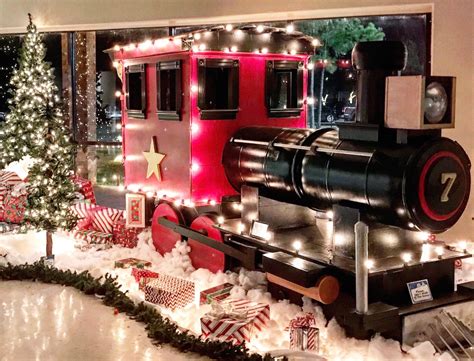 The Old Vintage Christmas Train And A Cozy Fireplace Welcome You In