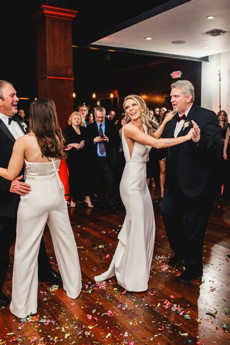 Same Sex Brides Share A Dance With Their Fathers At The Kansas City